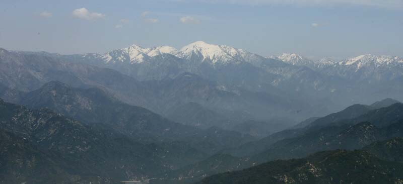 2005-04-26: 5700-ft. Facing North-East at Echo Rock near summit of Mt. Wilson. Mount Baldy is in the center.