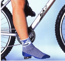 Remove your shoes and sit on your bike, supporting yourself against a wall. 