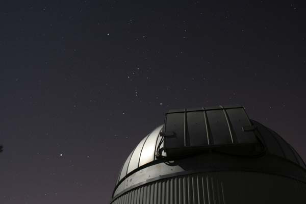 Another sequence featuring Sirius and Orion rising behind one of the six CHARA telescopes